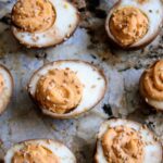 7 Deviled eggs sit on a cheeseboard