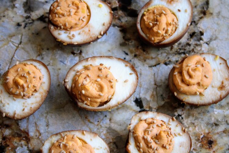 7 Deviled eggs sit on a cheeseboard